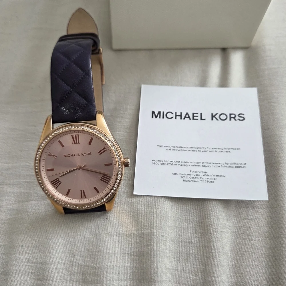 Michael Kors Rosegold Dial With A Quilted Plum Leather Strap